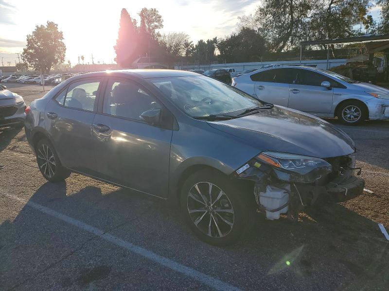 Photo 4 from auction – 2017 TOYOTA COROLLA L with VIN 5YFBURHE4HP574636