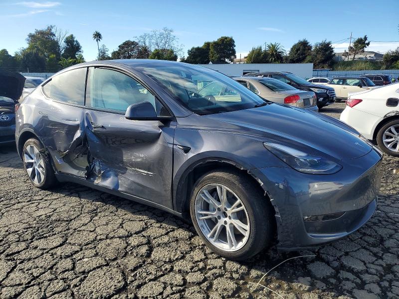 Photo 4 from auction – 2023 TESLA MODEL Y with VIN 7SAYGDEE0PF806588