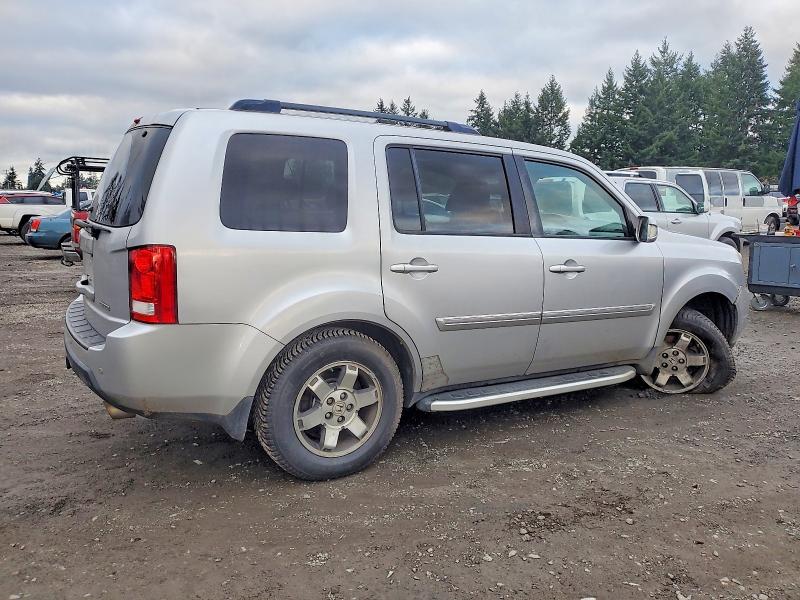 Photo 3 from auction – 2011 HONDA PILOT TOUR with VIN 5FNYF3H90BB013616