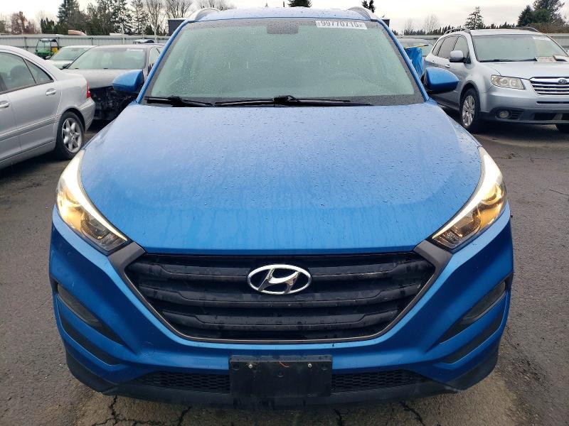 Photo 5 from auction – 2016 HYUNDAI TUCSON LIM with VIN KM8J33A46GU126618