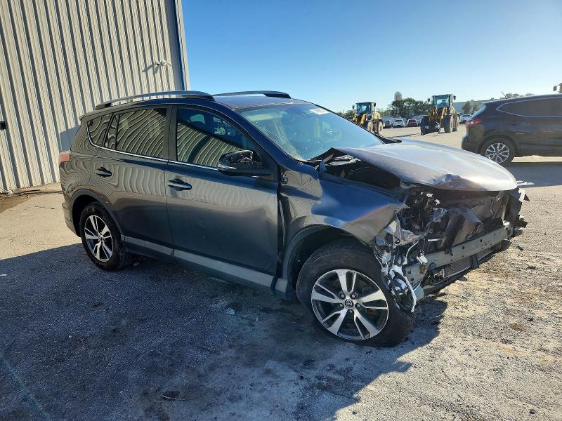 Photo 4 from auction – 2018 TOYOTA RAV4 with VIN 2T3WFREV8JW499144