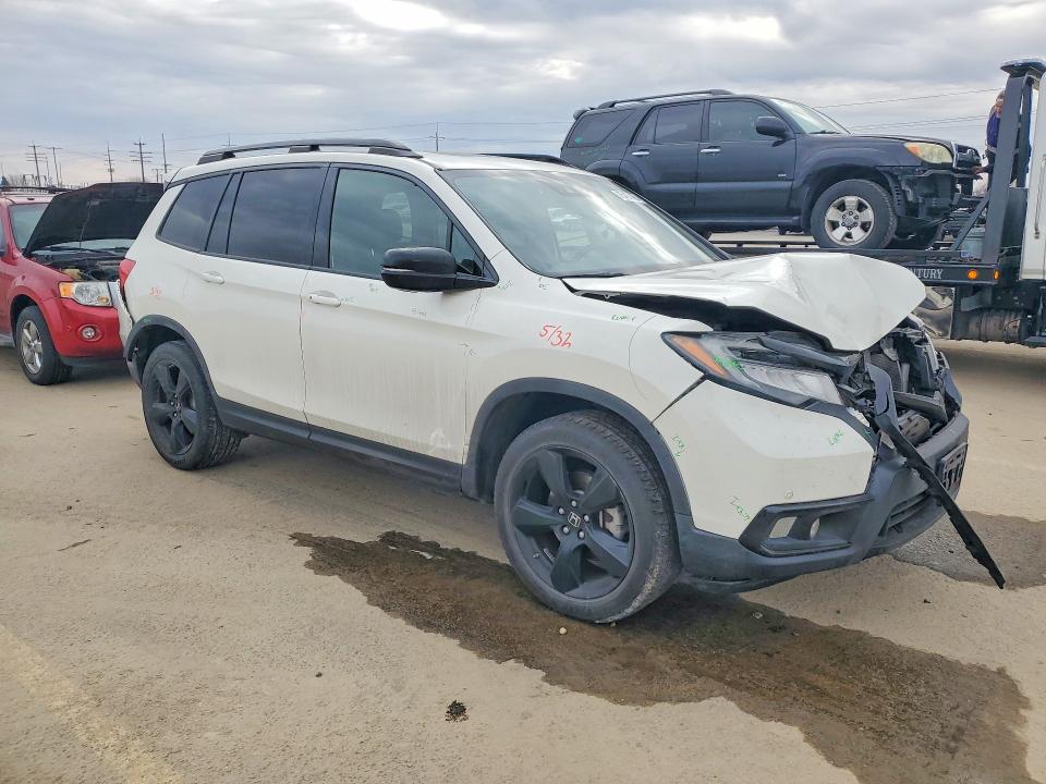 Photo 4 from auction – 2019 HONDA PASSPORT E with VIN 5FNYF8H02KB009954