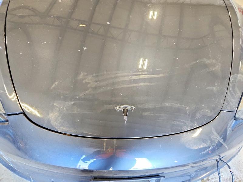Photo 11 from auction – 2018 TESLA MODEL 3 with VIN 5YJ3E1EB2JF107794