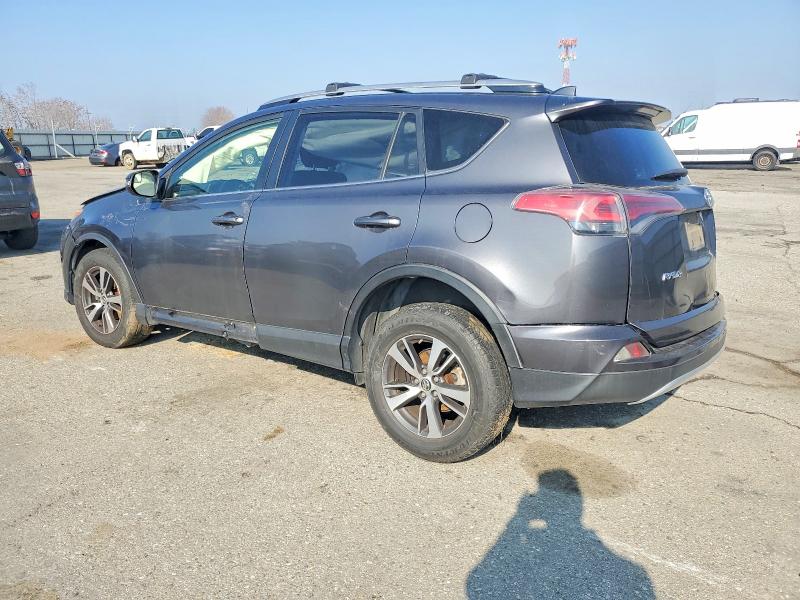 Photo 2 from auction – 2016 TOYOTA RAV4 with VIN JTMWFREV6GJ070057