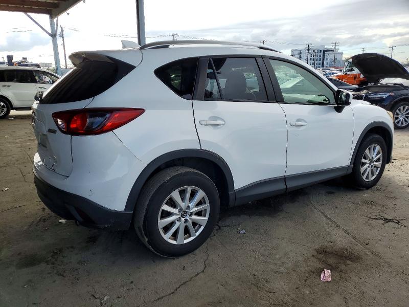 Photo 3 from auction – 2014 MAZDA CX-5 with VIN JM3KE2CY6E0348732