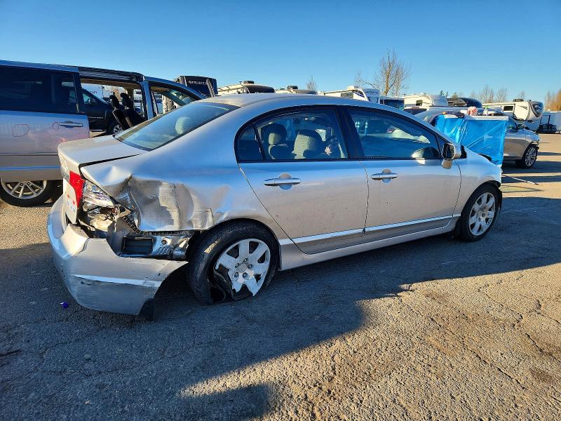 Photo 3 from auction – 2011 HONDA CIVIC LX with VIN 2HGFA1F59BH304069