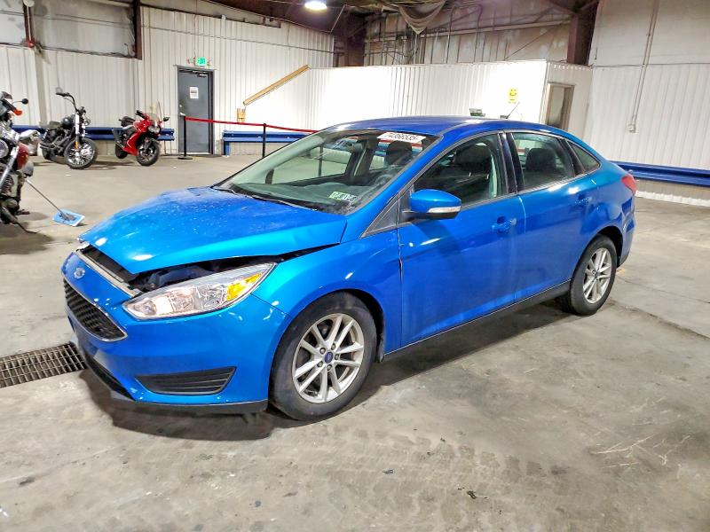 FORD FOCUS SE 2016 with VIN 1FADP3F28GL359442 - Photo from auction