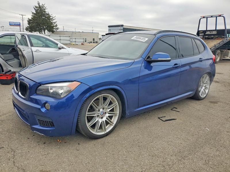 BMW X1 XDRIVE2 2014 with VIN WBAVL1C59EVY10633 - Photo from auction