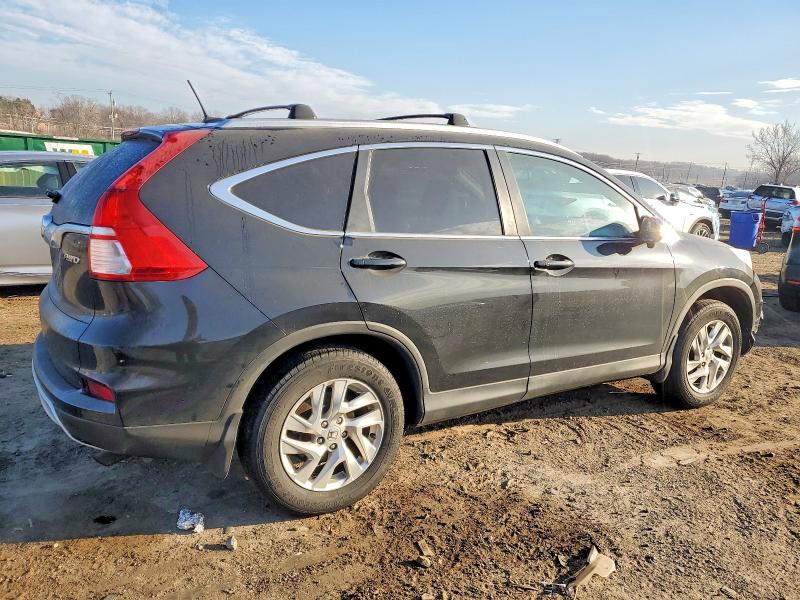 Photo 3 from auction – 2015 HONDA CR-V EXL with VIN 5J6RM4H72FL053398