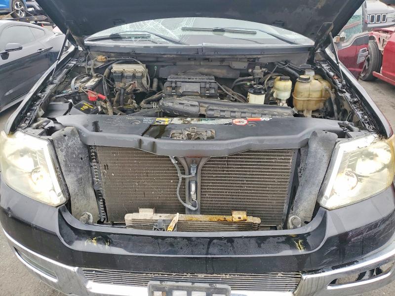 Photo 11 from auction – 2004 FORD F150 with VIN 1FTPW14524KC98800