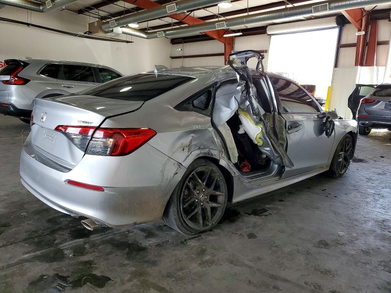 Photo 3 from auction – 2022 HONDA CIVIC SPOR with VIN 2HGFE2F59NH557312