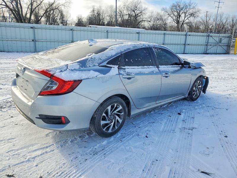 Photo 3 from auction – 2018 HONDA CIVIC EX with VIN 2HGFC2F74JH563486