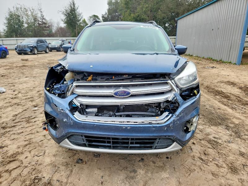 Photo 5 from auction – 2018 FORD ESCAPE with VIN 1FMCU0GDXJUA61002
