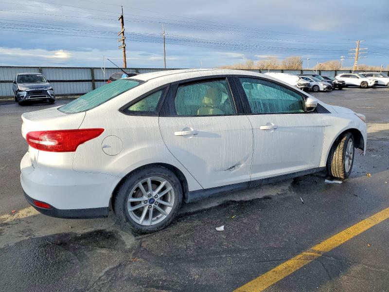 Photo 3 from auction – 2015 FORD FOCUS SE with VIN 1FADP3F20FL348448