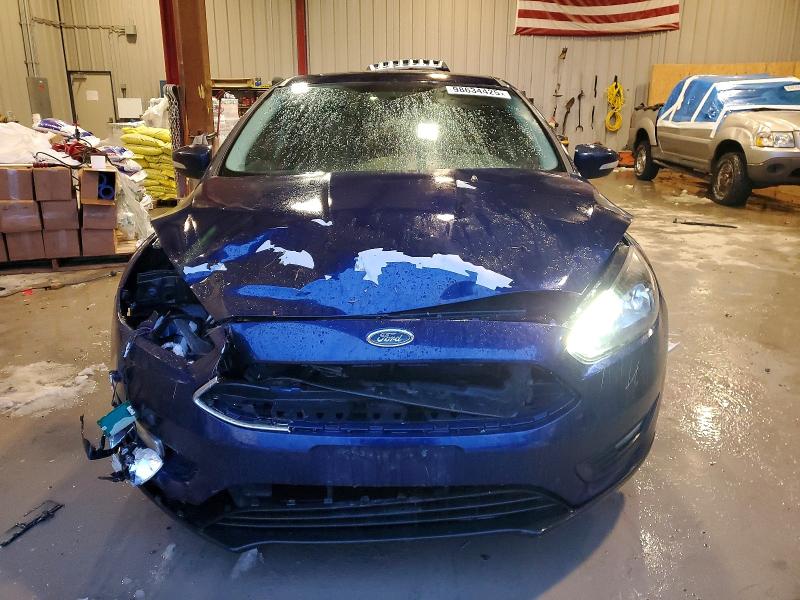 Photo 5 from auction – 2016 FORD FOCUS SE with VIN 1FADP3F23GL359686