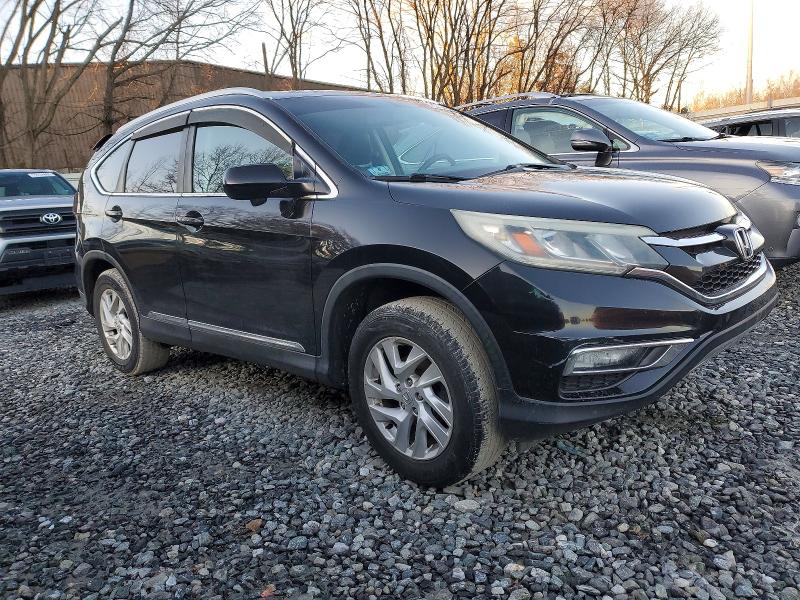 Photo 4 from auction – 2016 HONDA CR-V EXL with VIN 2HKRM4H73GH619502
