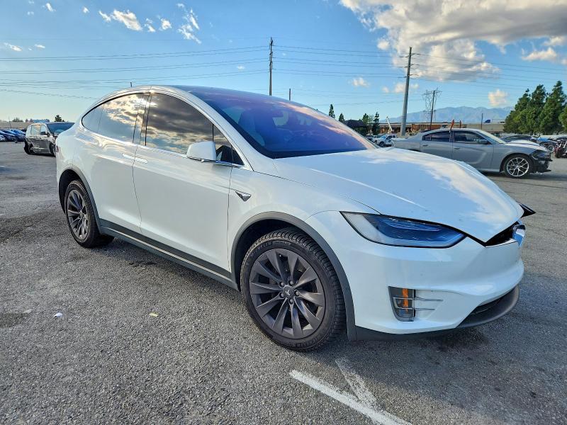 Photo 4 from auction – 2018 TESLA MODEL X with VIN 5YJXCAE24JF090181
