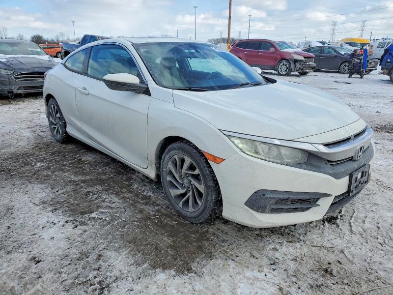Photo 4 from auction – 2016 HONDA CIVIC LX with VIN 2HGFC4B09GH303288