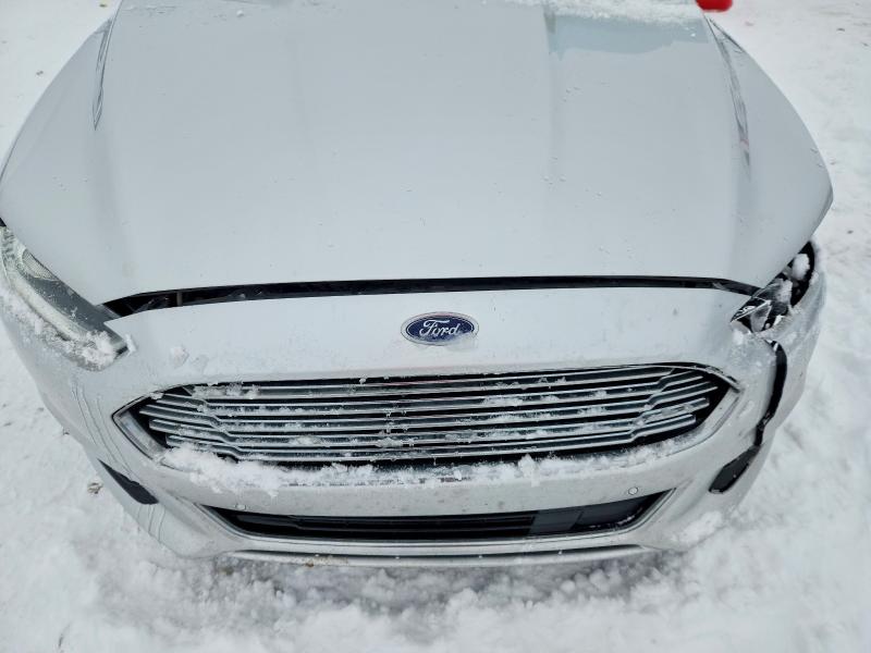 Photo 11 from auction – 2016 FORD FUSION with VIN 3FA6P0SU0GR320702