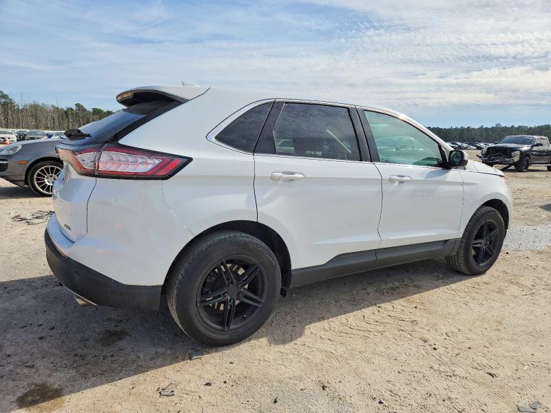 Photo 3 from auction – 2015 FORD EDGE with VIN 2FMTK3J8XFBC09049