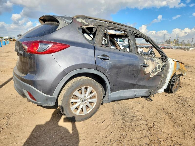 Photo 3 from auction – 2014 MAZDA CX-5 TOURI with VIN JM3KE2CY8E0369095
