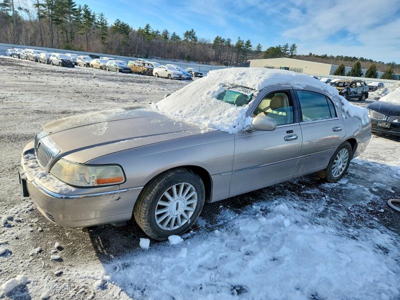 LINCOLN TOWN CAR E 2003 with VIN 1LNHM81W53Y645270 - Photo from auction