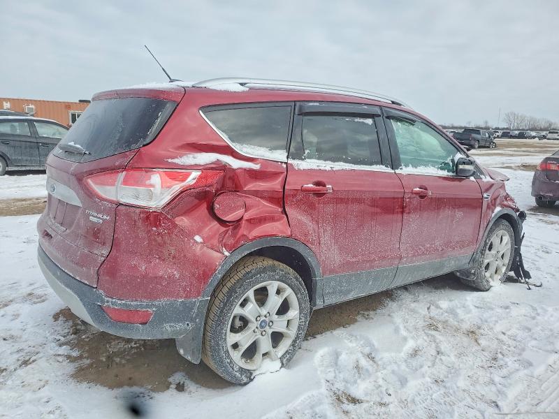 Photo 3 from auction – 2016 FORD ESCAPE TIT with VIN 1FMCU9J95GUC21532