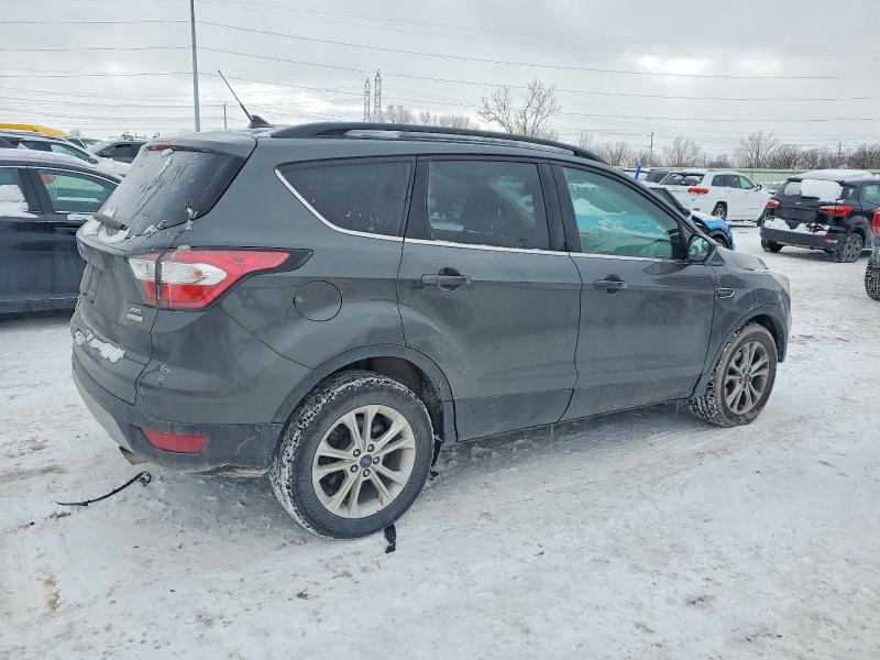 Photo 3 from auction – 2018 FORD ESCAPE with VIN 1FMCU0HDXJUC03315
