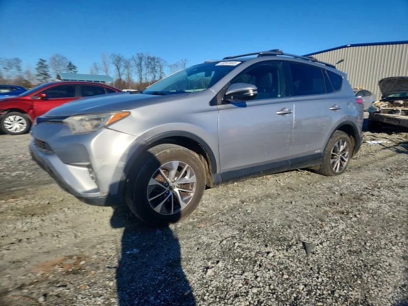 TOYOTA RAV4 HV LE 2017 with VIN JTMRJREV6HD079711 - Photo from auction