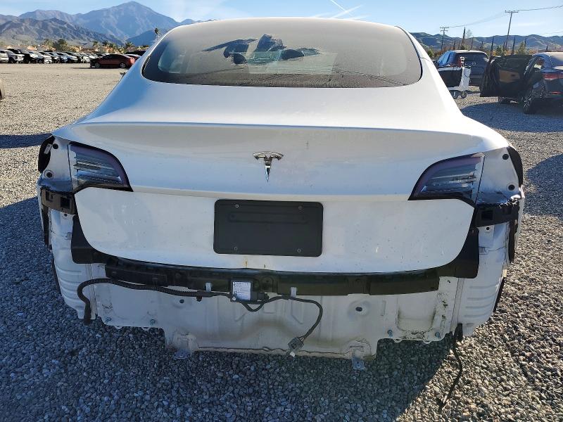 Photo 6 from auction – 2021 TESLA MODEL 3 with VIN 5YJ3E1EA4MF027411