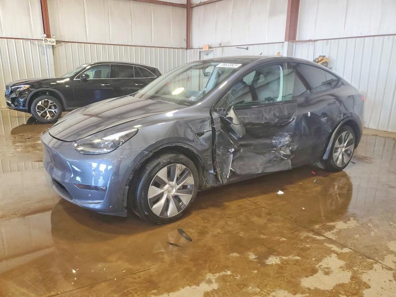 TESLA MODEL Y 2023 with VIN 7SAYGAEE7PF752866 - Photo from auction