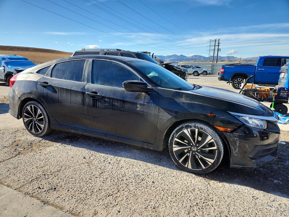 Photo 4 from auction – 2016 HONDA CIVIC with VIN 19XFC2F54GE052474