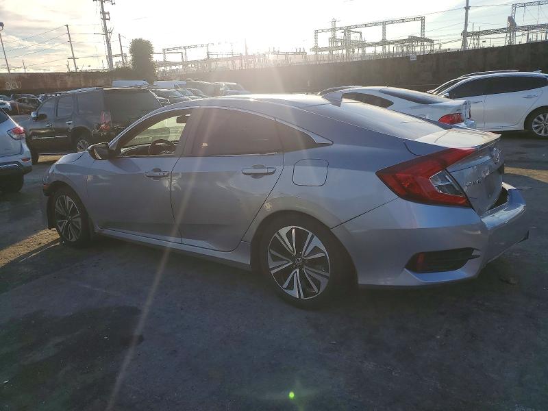 Photo 2 from auction – 2016 HONDA CIVIC with VIN 2HGFC1F74GH653885