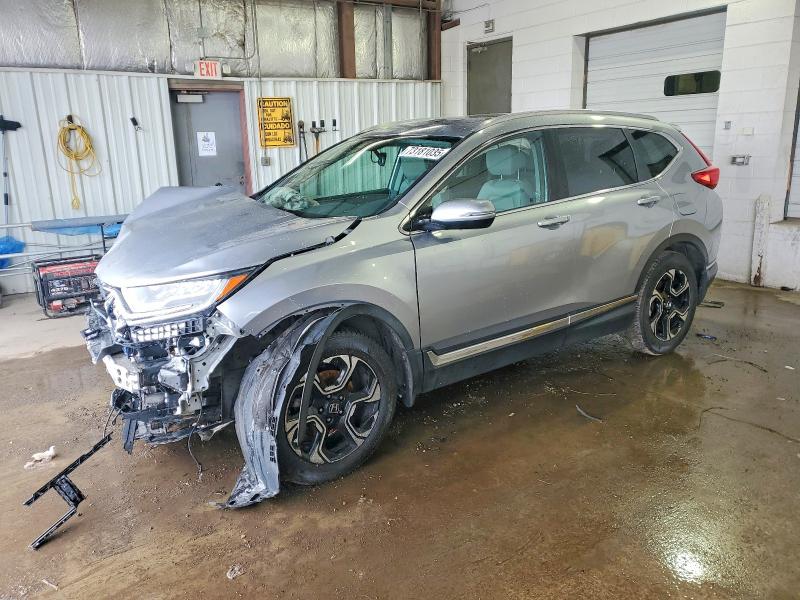 Photo 1 from auction – 2017 HONDA CR-V with VIN 2HKRW2H99HH663960