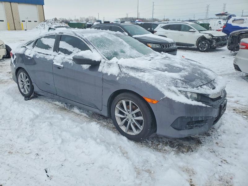 Photo 4 from auction – 2018 HONDA CIVIC LX with VIN 19XFC2F53JE033079
