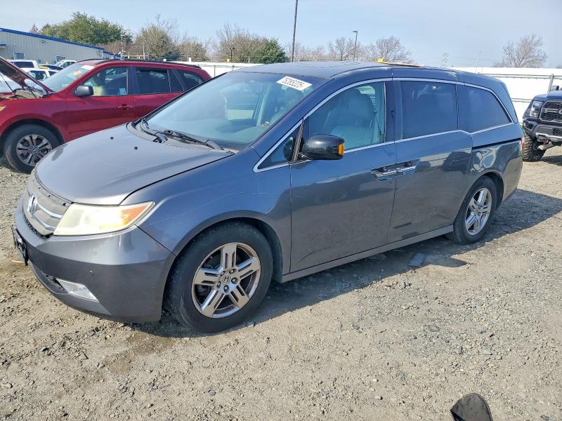 Photo 1 from auction – 2011 HONDA ODYSSEY TO with VIN 5FNRL5H92BB024724