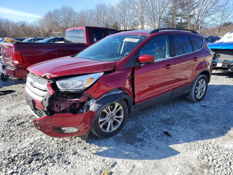 FORD ESCAPE SE 2018 with VIN 1FMCU9GD6JUD45893 - Photo from auction