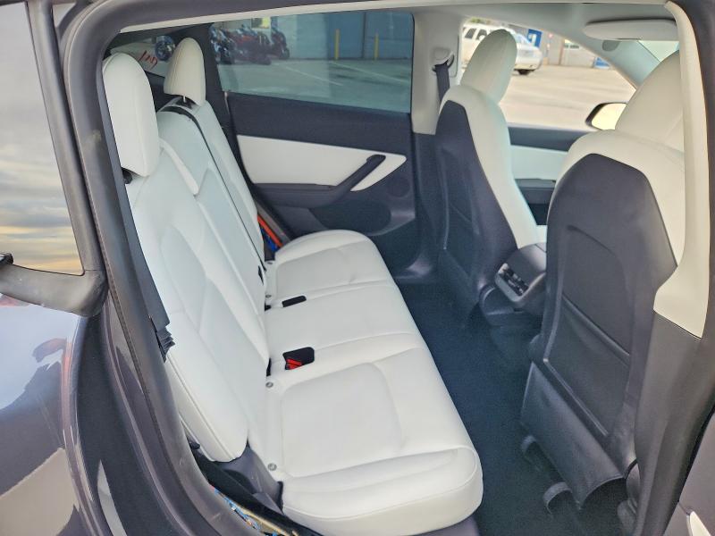 Photo 10 from auction – 2022 TESLA MODEL Y with VIN 7SAYGDEE2NF339641
