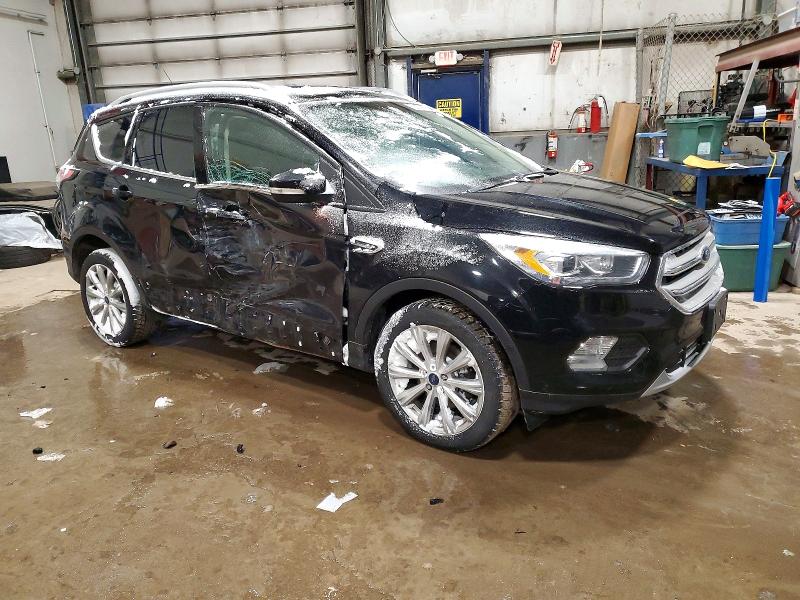 Photo 4 from auction – 2018 FORD ESCAPE TIT with VIN 1FMCU9J92JUC21723