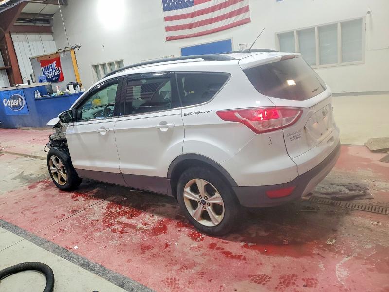 Photo 2 from auction – 2014 FORD ESCAPE SE with VIN 1FMCU9GX8EUE49074