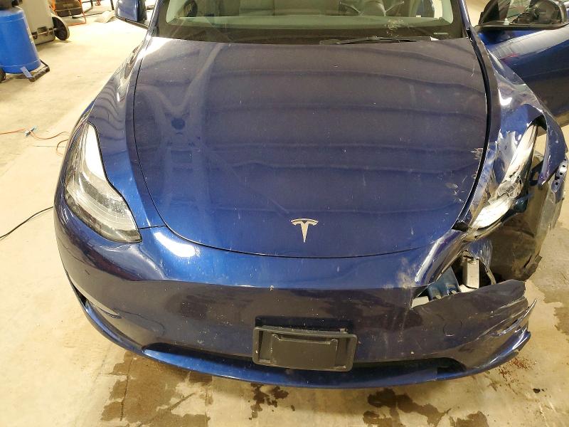 Photo 11 from auction – 2023 TESLA MODEL Y with VIN 7SAYGDEE8PA063143