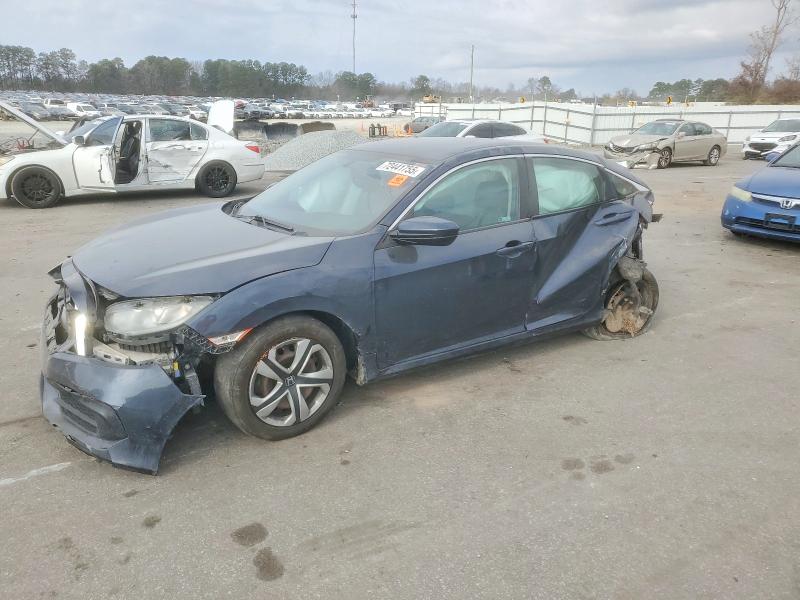 HONDA CIVIC LX 2018 with VIN 2HGFC2F53JH573490 - Photo from auction
