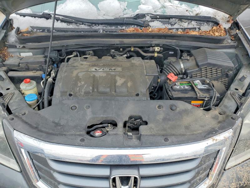 Photo 11 from auction – 2010 HONDA ODYSSEY TO with VIN 5FNRL3H96AB069183