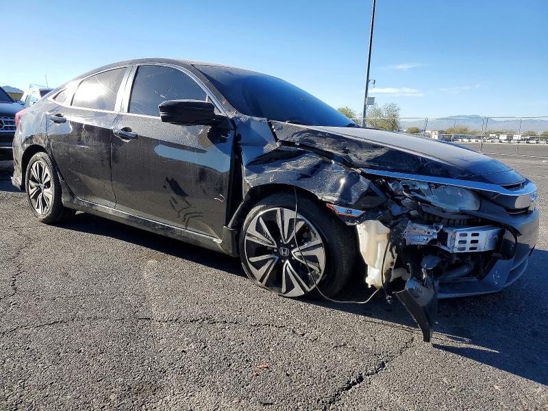 Photo 4 from auction – 2016 HONDA CIVIC with VIN 2HGFC1F49GH640930