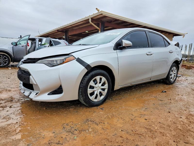 TOYOTA COROLLA L 2018 with VIN 5YFBURHE5JP840977 - Photo from auction