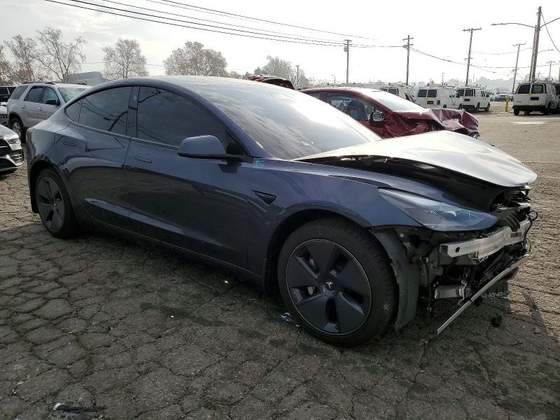 Photo 4 from auction – 2023 TESLA MODEL 3 with VIN 5YJ3E1EA8PF576193