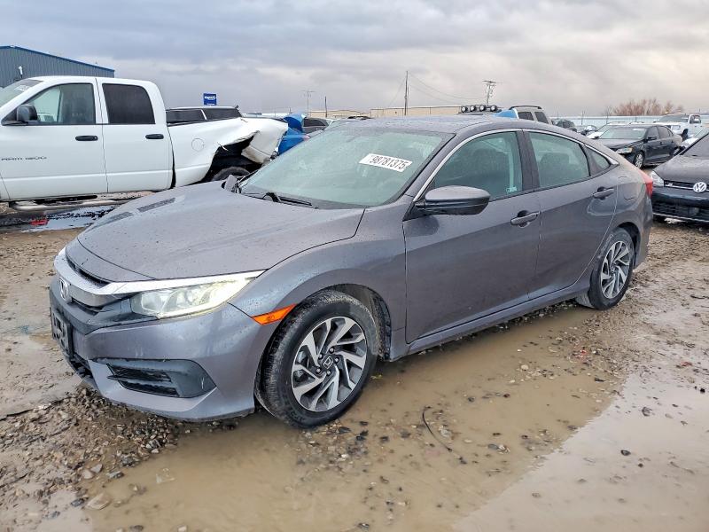 Photo 1 from auction – 2018 HONDA CIVIC EX with VIN 2HGFC2F77JH588172