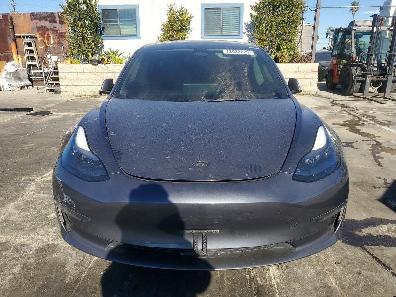 Photo 5 from auction – 2023 TESLA MODEL 3 with VIN 5YJ3E1EA9PF404772