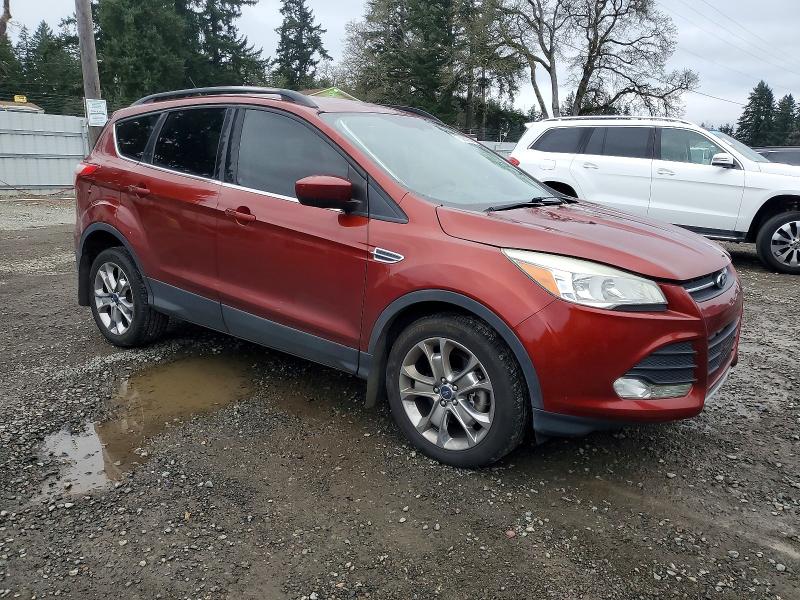 Photo 4 from auction – 2015 FORD ESCAPE SE with VIN 1FMCU9G9XFUA68376