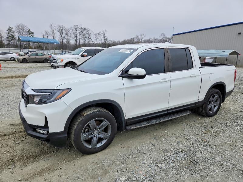 HONDA RIDGELINE 2021 z numerem VIN 5FPYK3F56MB025503 - Zdjęcie z aukcji